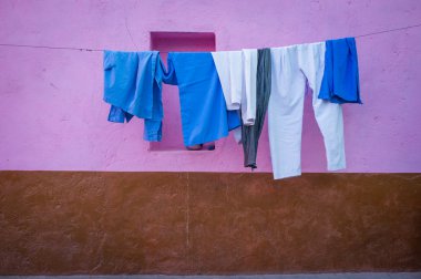 Clothes hang on wire