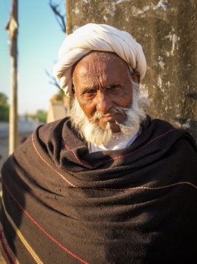 Elderly tribesman poses