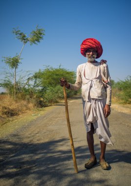 Elderly Rabari tribesman stands
