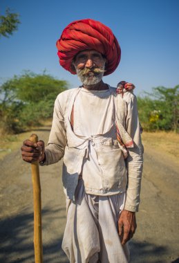 Elderly Rabari tribesman stands