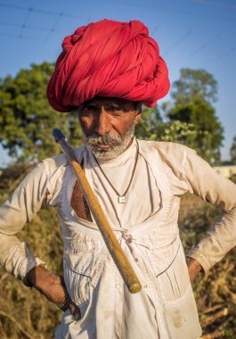 Elderly Rabari tribesman stands