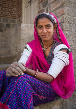 Indian tribeswoman sits