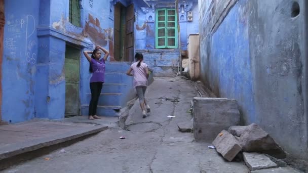 Two girls climbing on stairs — Stock Video