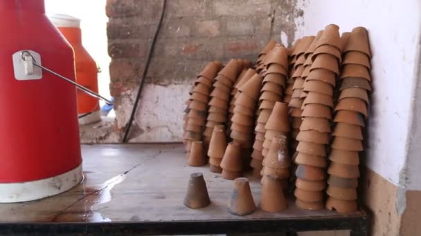 Cups for chai standing on a pile — Stock Video