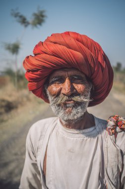 Elderly Rabari tribesman stands