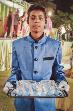 Young Indian boy working