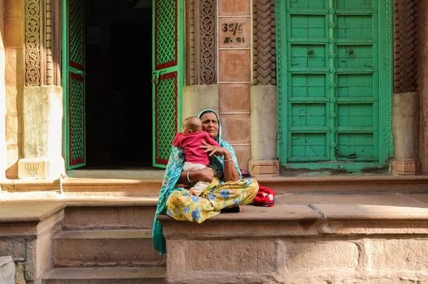 Grandmother holding  grandchild — Stock fotografie