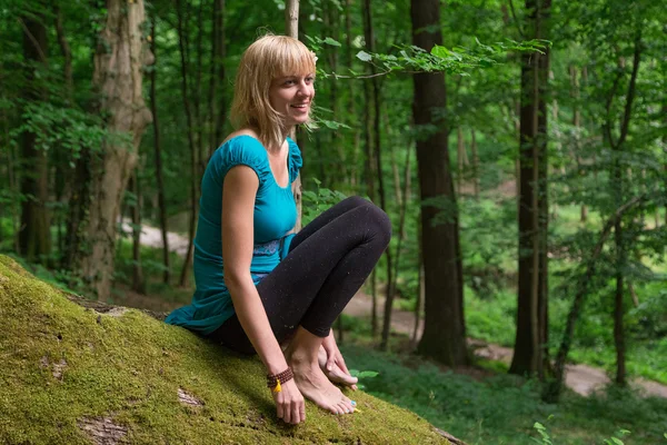 Woman practicing yoga — Stock Photo, Image