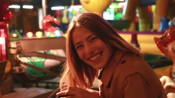 Woman having fun in amusement park — Stock Video