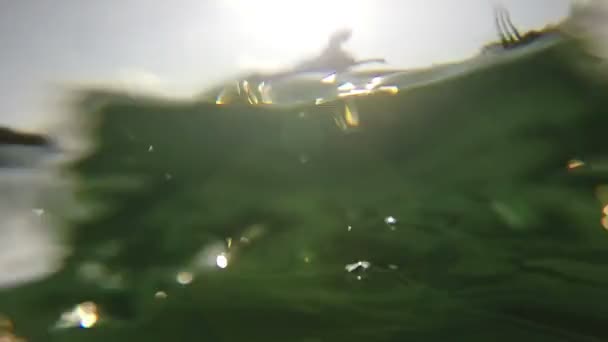 Man doing backflip from a canoe — Stock Video