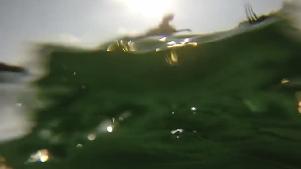 Man doing backflip from a canoe — Stock Video