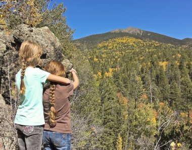 A Pair of Girls Admires a View of Agassiz Peak clipart