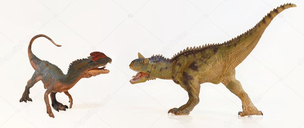 A Dilophosaurus and a Carnotaurus Face Off