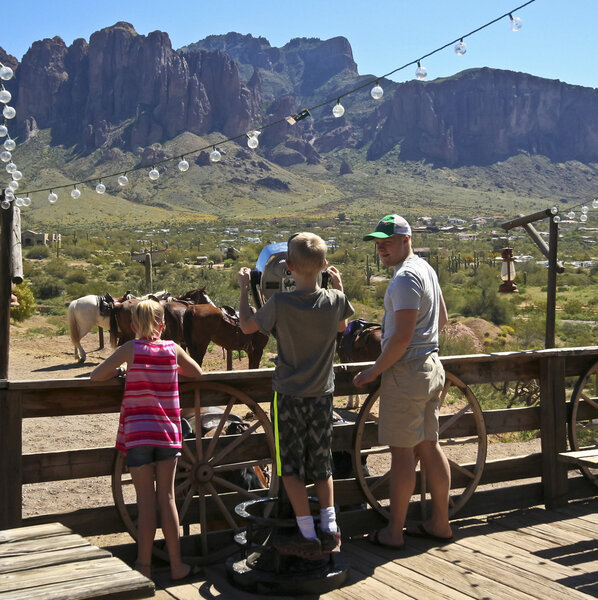 A Boy Uses a Telescope at Goldfield Ghost Town, Arizona 