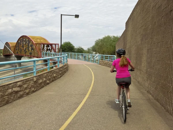 A Woman Bikes the Aviation Bikeway, Tucson — Stock Photo, Image