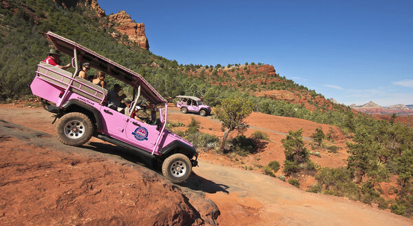A Pink Jeep Tour Descends Broken Arrow Trail
