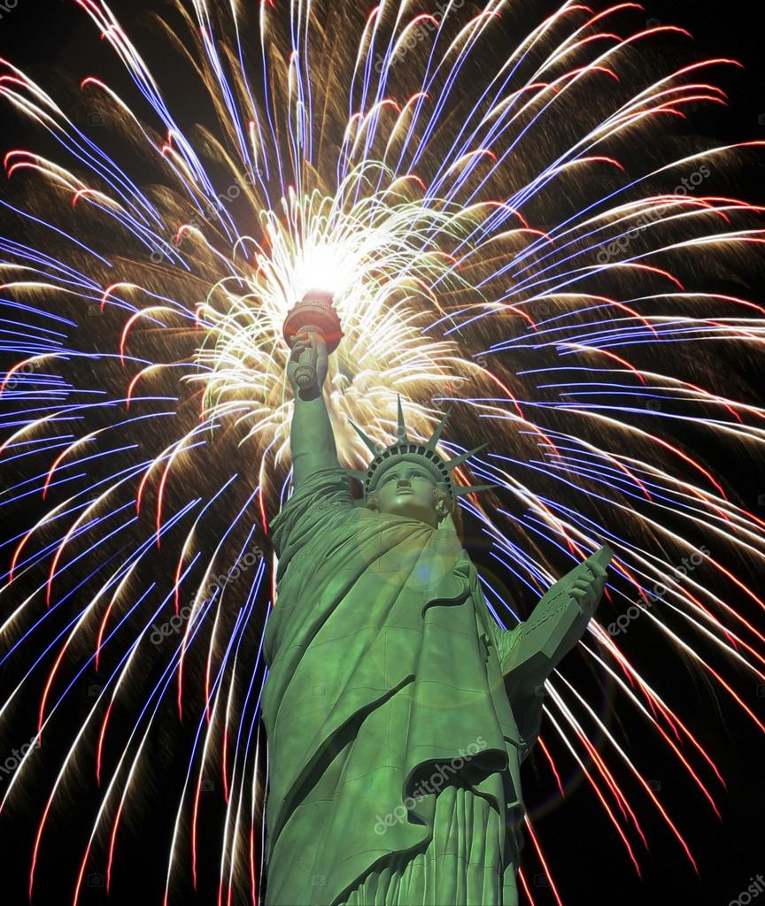 A Statue of Liberty Fourth of July Fireworks Celebration Stock Photo by