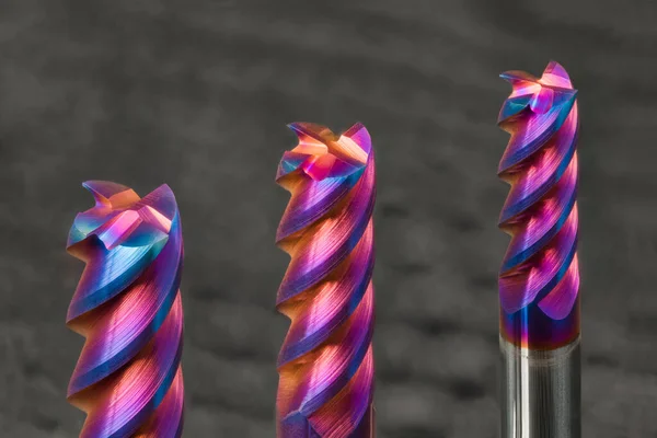 Drie Stalen Eindmolens Met Prachtige Gekleurde Nano Coating Een Grijze — Stockfoto