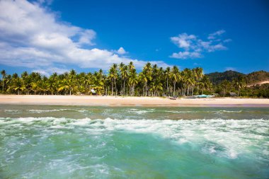 Beautiful view on tropical Duli beach at Palawan island. Philippines.  clipart