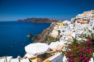  Panoramic view at Oia village in suny day on Santorini island, Greece clipart