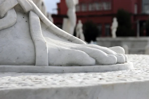 Detalhe pé de estátua atleta masculino — Fotografia de Stock