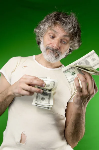 Mature Man Lot Dollars Feeling Anxious — Stock Photo, Image