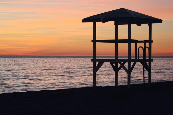 Silhouette torre bagnino — Foto Stock