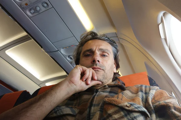 Man on airplane board — Stock Photo, Image