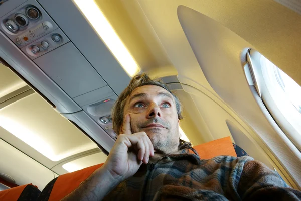 Man on airplane board — Stock Photo, Image