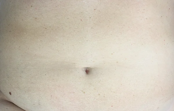 Ombelico Maturo ventre femminile — Foto Stock