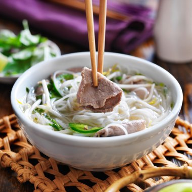 Bowl of pho with beef clipart