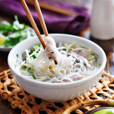 Bowl of pho with beef clipart