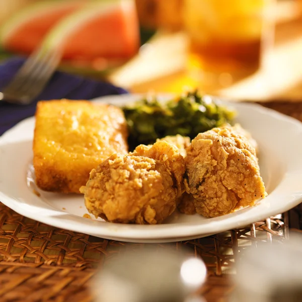 Fried chicken with collard greens — Stock Photo, Image