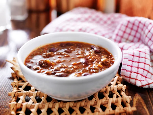 Bowl of chili shot with selective focus — Stock Photo, Image