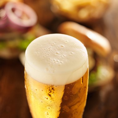 glass of beer with burgers clipart