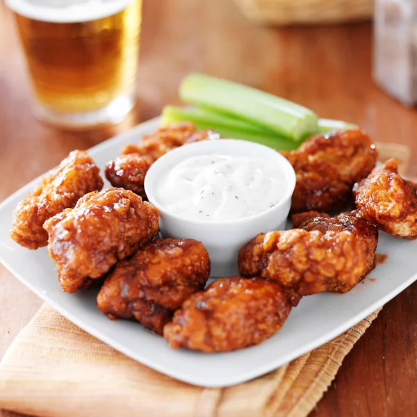 Boneless buffalo bbq chicken wngs — Stock Photo, Image