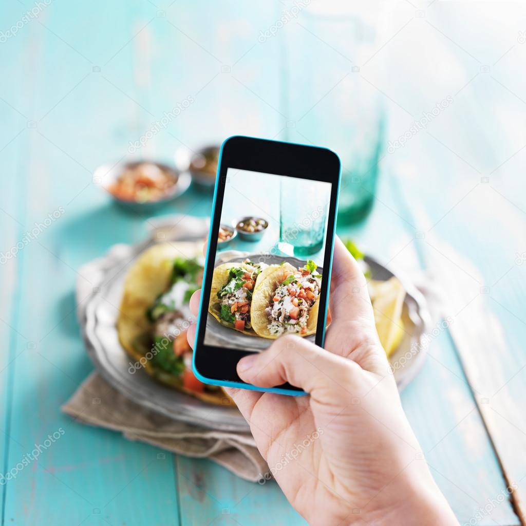 Taking photo of tacos with smart phone