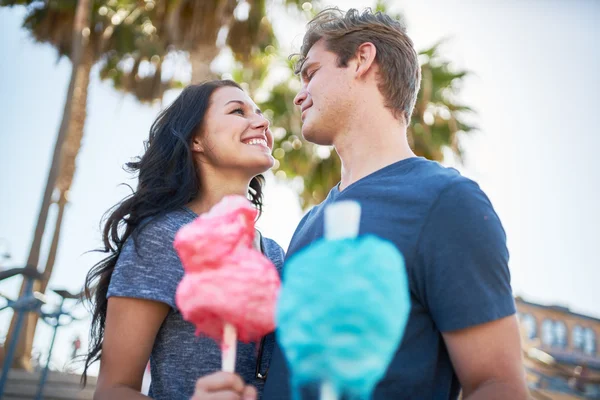 Romantic couple with cotton candies — Stock Photo, Image
