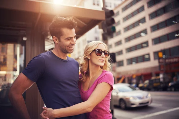 Romantic couple on street corner — Stock Photo, Image