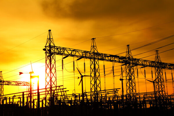 Part of high voltage substation at sunset.