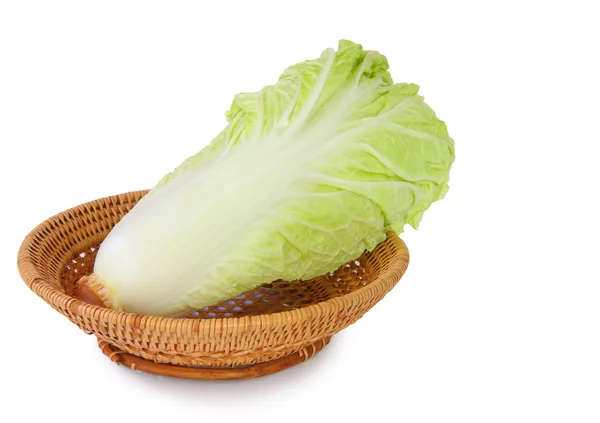 Chinese cabbage on basket over white. — Stock Photo, Image