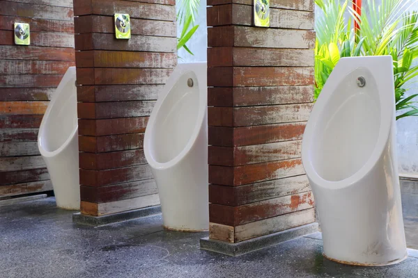 White porcelain urinals — Stock Photo, Image