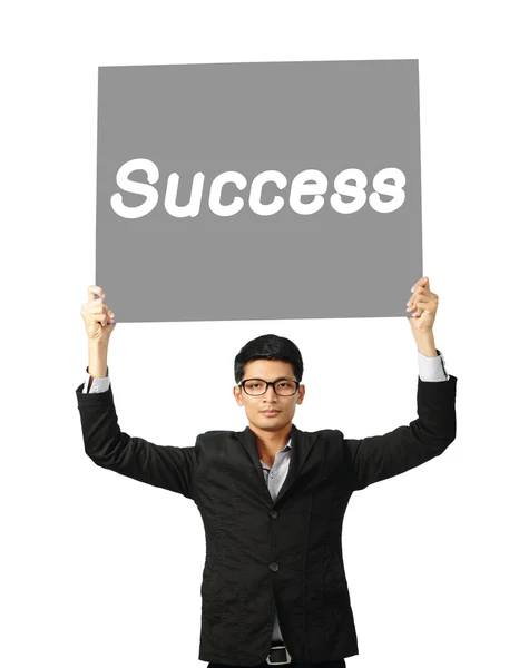 Asia businessman show wording success on gray paper board — Stock Photo, Image