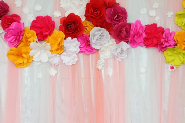 Colorful backdrop paper flower with fabric arrangement — Stock Photo, Image