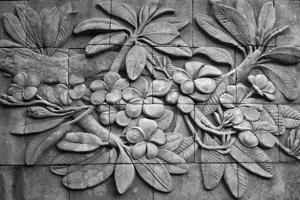 Black and white of low relief cement Thai style handcraft of plu — Stock Photo, Image