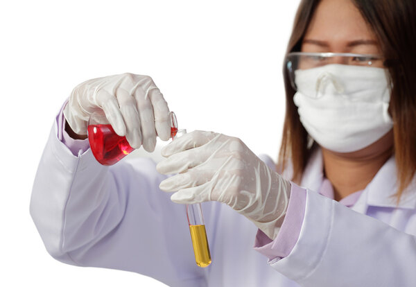 Young scientist or tech holds liquid biological sample in hands.