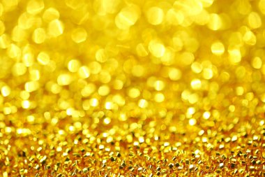 Bokeh arka plan ile altın ışıkları.