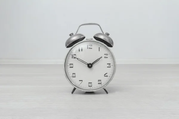 Hours an alarm clock on a white background — Stock Photo, Image