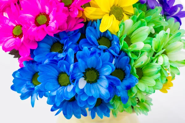 Colorful fresh flowers in a jug — Stock Photo, Image