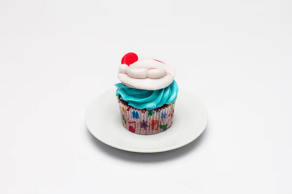 Karácsonyi cupcake vaj tejszín jegesedés. — Stock Fotó